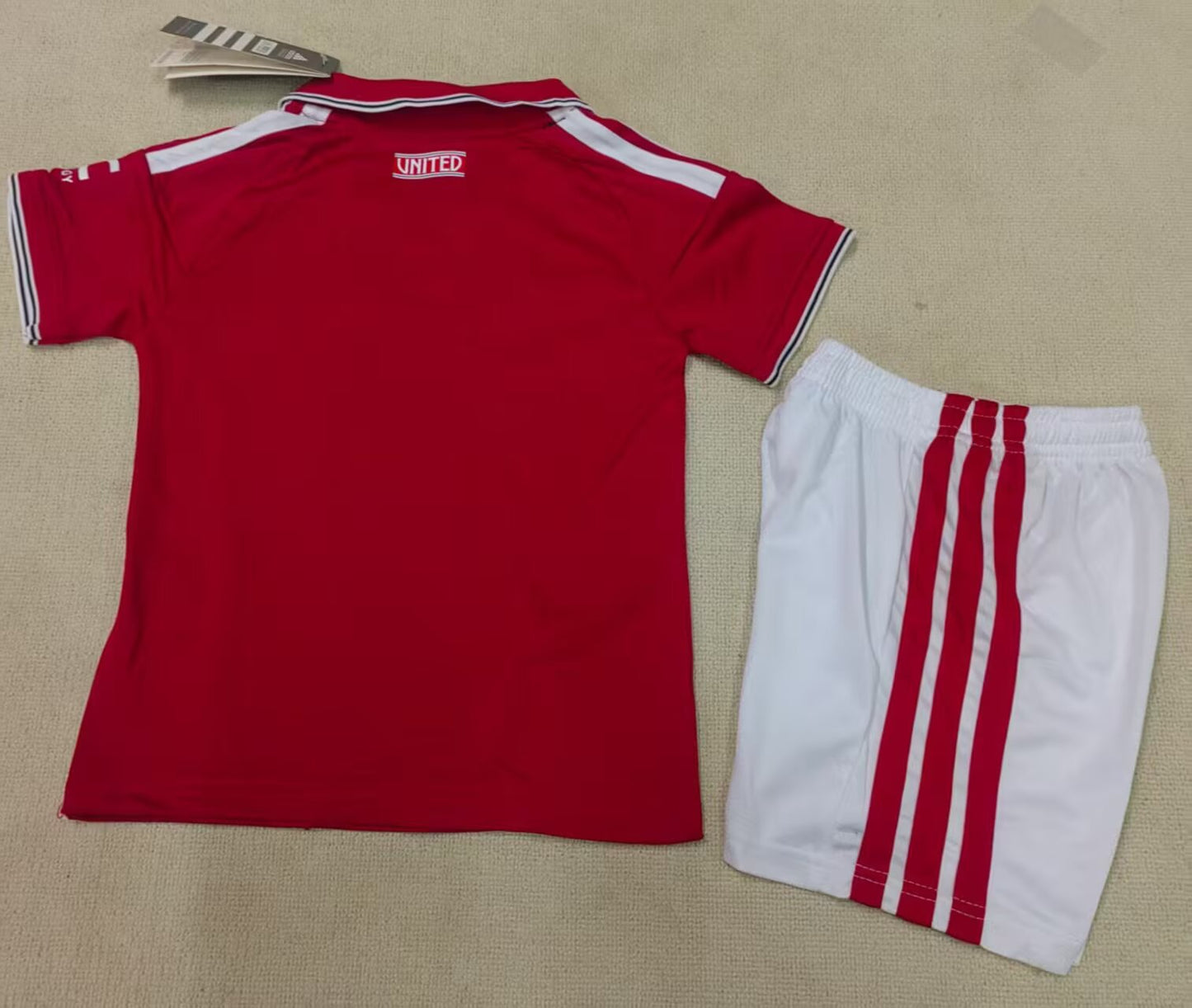 Manchester United 26/27 Kids Home kit