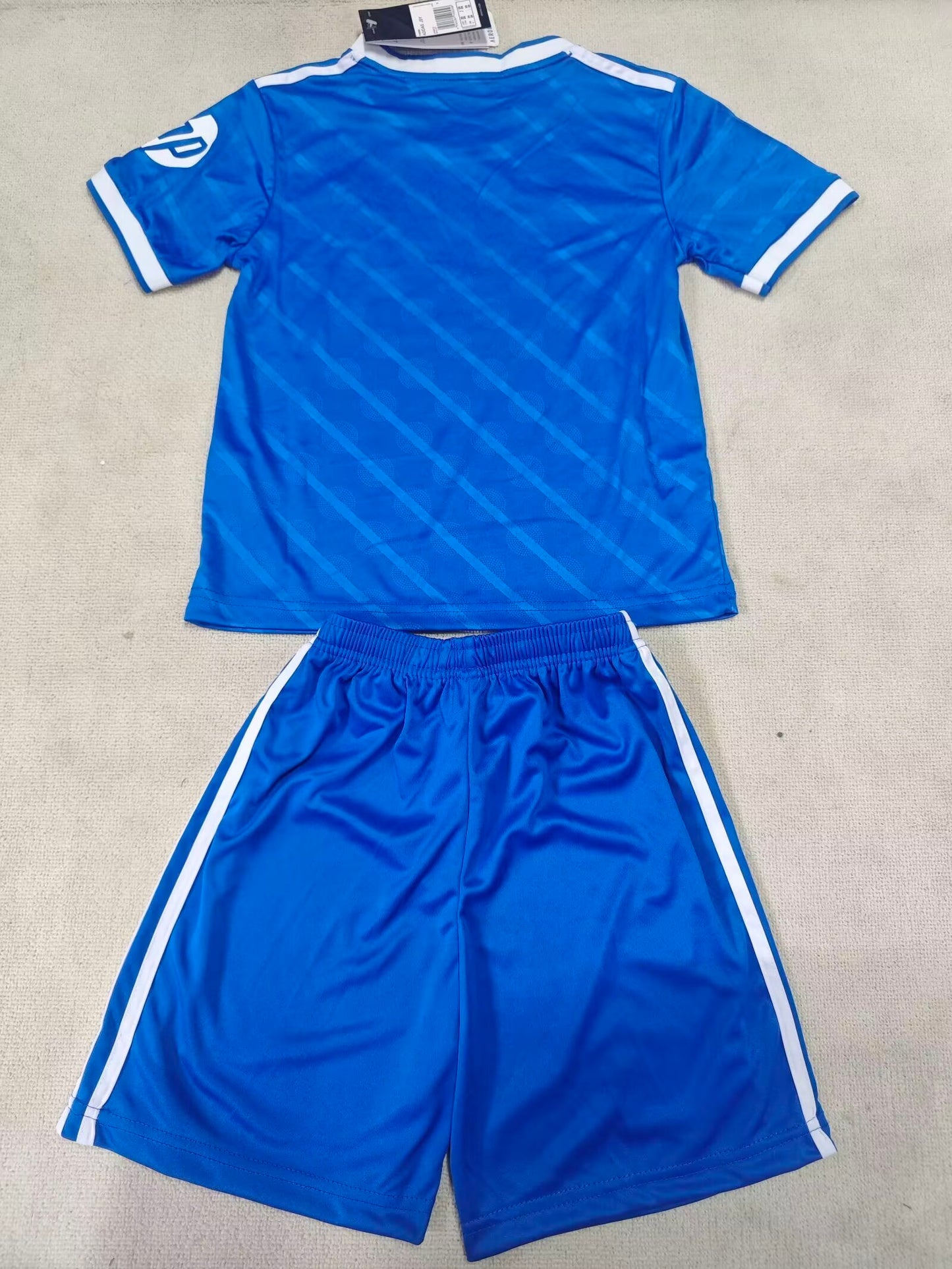 Real Madrid 25/26 kids blue kit