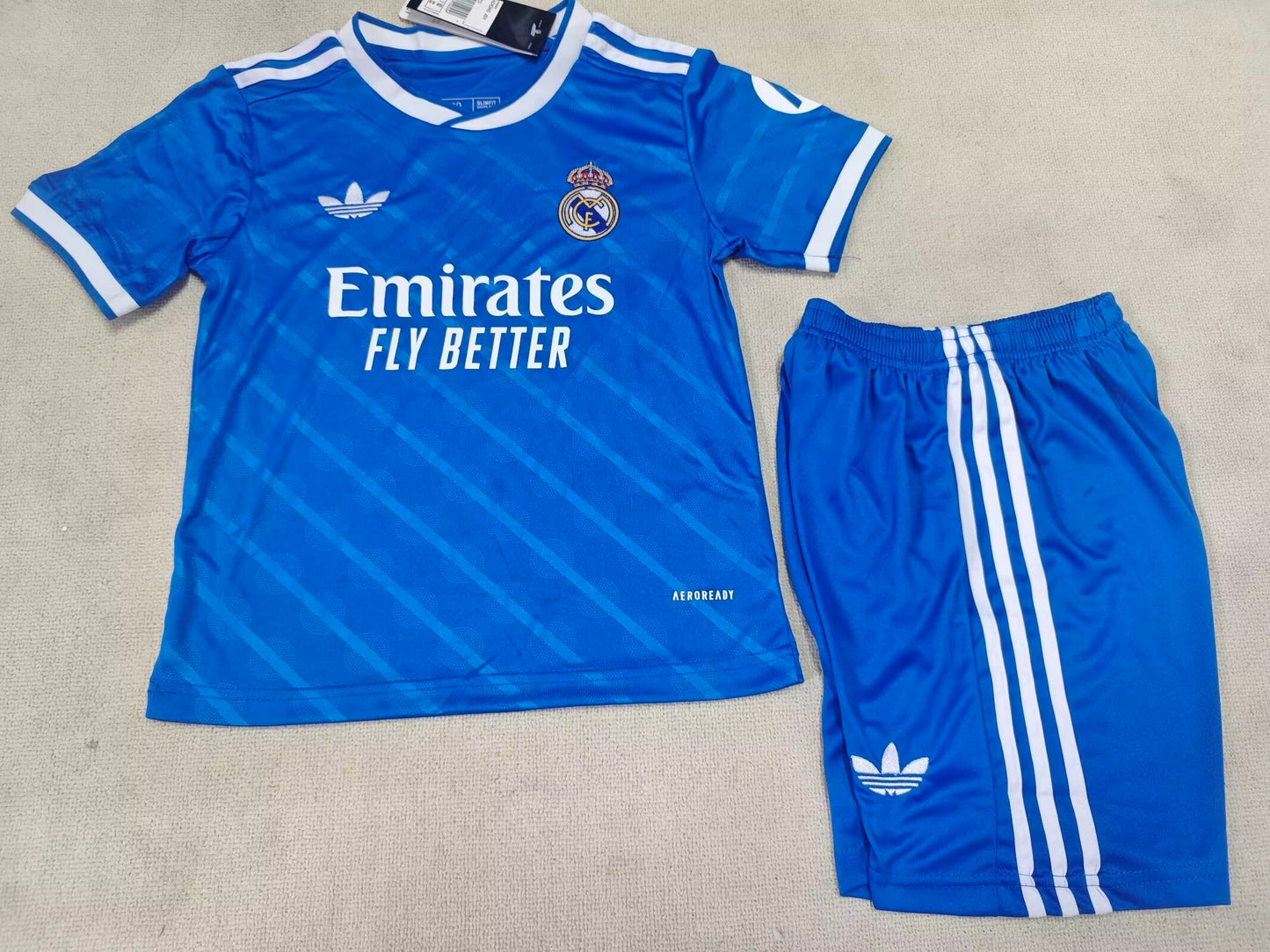 Real Madrid 25/26 kids blue kit