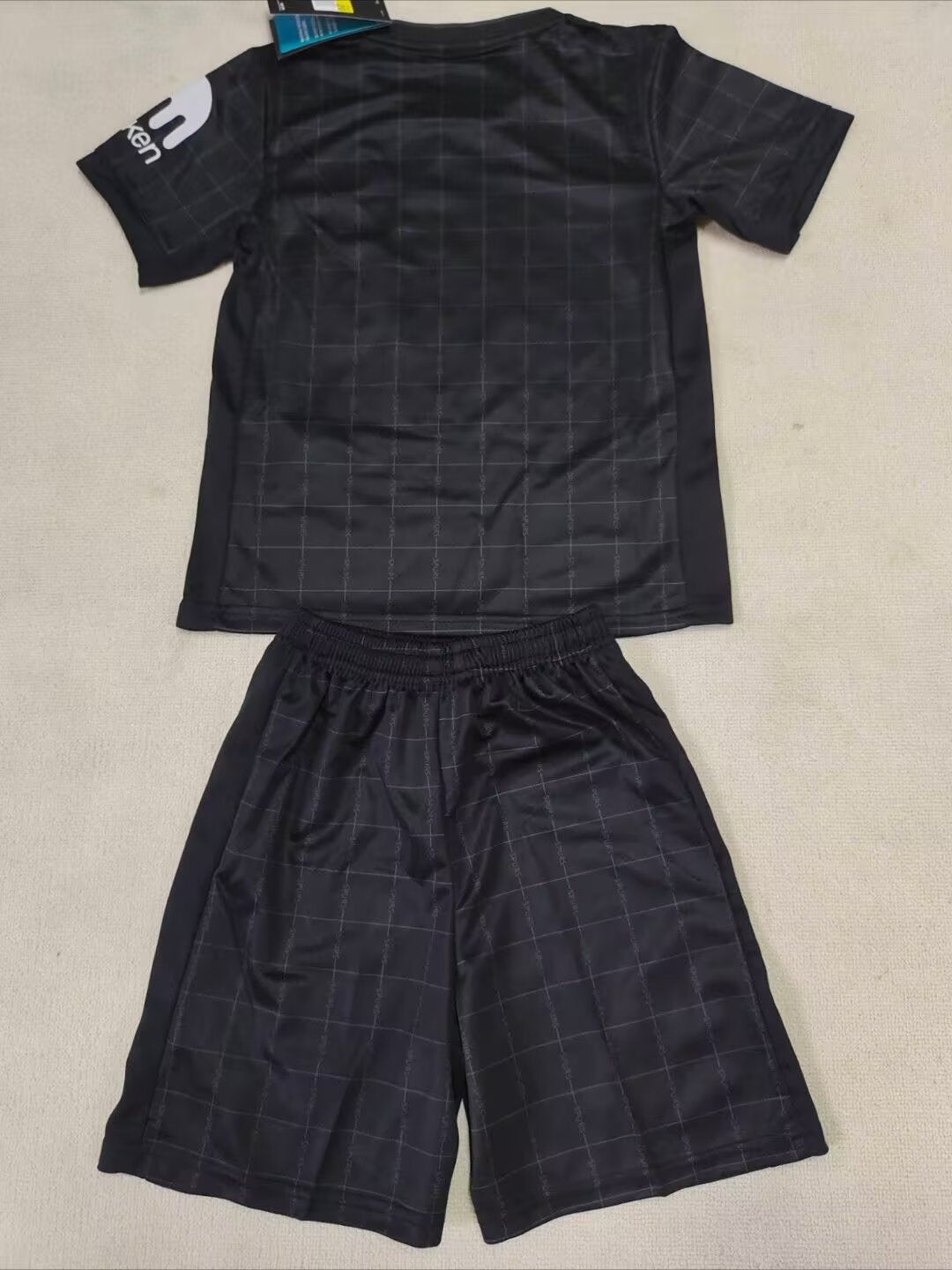 Tottenham Hotspurs 25/26 Kids Away Black kit