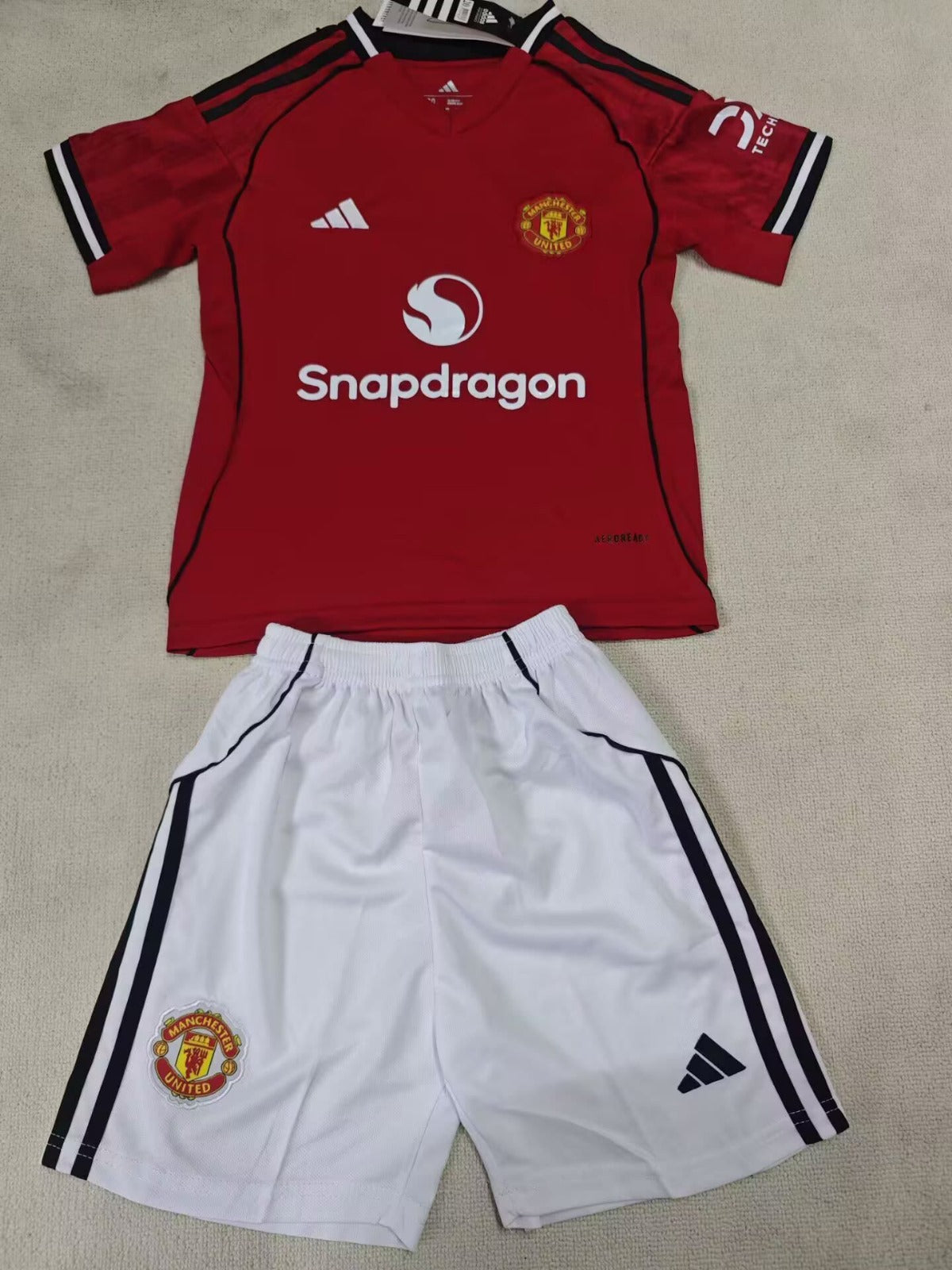 Manchester United 25/26 Kids Home Kit
